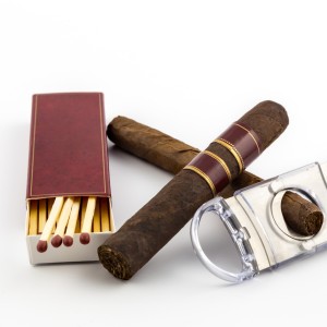 bigstock-Cigar-With-Matches-And-Cutter-58989464-1024x1024